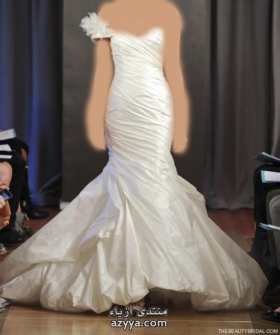 روعةللعروسة المحجبة فستانك هنا اخترى فستانك بنفسك لعام 2012 