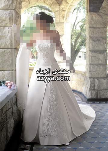 بحزام الساتان لفساتين الزفاففساتين الزفاف لـ ريم اكرا- شتاء 2013مجموعة